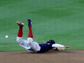 Xander Bogaerts of the Red Sox dives, but can’t make a play during a game against the Blue Jays in Buffalo late last month. The teams open a five-game series in Boston on Thursday night.