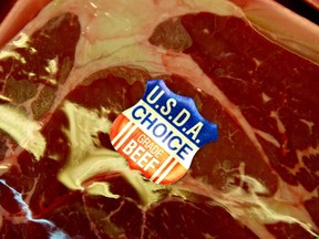 A USDA Choice Beef sticker is displayed on beef rump roast at a supermarket in Princeton, Illinois, U.S., on Friday, April 1, 2011. (Bloomberg file photo)