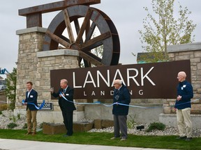 Mayor Peter Brown cut the ribbon on the water feature at the grand opening of the Lanark Landing community. Photo by Kelsey Yates