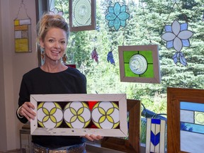 BettyLynne Burwash displays some of her beautiful stained glass at her Burwash Glassworks studio. photo by Pam Doyle/www.pamdoylephoto.com