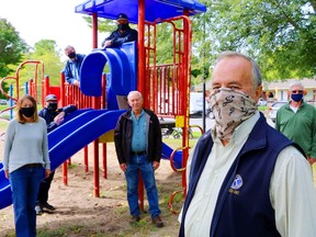 Kiwanis Club of Tweed president Chris Foran, foreground, stands in the club's playground Monday in Tweed Memorial Park. With him from background left were playground committee members Rachelle Hardesty, Al McNeil, Michael Cassidy, James Hanna, Fred Albert and Jim Roulston.
