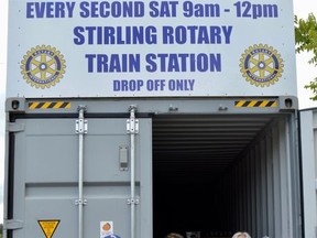 Stirling Rotarians Alan Wells, Darlene Sage and Donna Graff make a little more storage space inside the large trailer, situated in the parking lot just north of the Stirling railway station. The extra space will be required for even more empties to be collected in a very special bottle drive/food drive planned for Saturday, Sept. 19 from 9 a.m. to noon. All proceeds along with non-perishable food items collected will go directly to the Stirling Food Bank.
TERRY VOLLUM