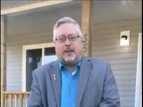 Habitat Prince Edward-Hastings executive director Glenn May-Anderson stands outside the organization's latest home in Quinte West. A dedication ceremony for the home was held this week.
SUBMITTED