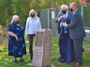 Selma Bochnek, left, helped unveil a stone cairn dedicating the Selma Bochnek Splash Pad at Parkdale Veterans Park Friday alongside past mayors Mary-Anne Sills and Ross McDougall as well as current city Mayor Mitch Panciuk (far right). The city also dedicated Sept. 25 as Selma Bochnek Day to recognize her 25 years of public service on city council and decades of volunteerism. DEREK BALDWIN