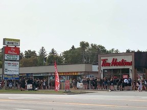 A photo posted on Twitter on Sept. 16 shows a mass gathering at lunch time at a Paris Road plaza, just north of St. John's College.