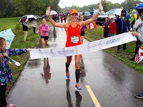 Mackenzie Bowman completes her virtual Boston Marathon on the trail beside the Thousand Islands Parkway on Sept. 13. Running behind Bowman are her daughter Brynn, left, and Riley Higgs. (SUBMITTED PHOTO)