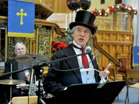 Canada's first prime minister, Sir John A. Macdonald, a.k.a. Brian Porter, consults his pocket watch to count down the final seconds to 2017 and wind up the 25th annual New Year's Eve Concerts in Historic Downtown Brockville at Wall Street United Church on Saturday, Dec. 31, 2016 in Brockville, Ont. Ronald Zajac/Brockville Recorder and Times/Postmedia Network