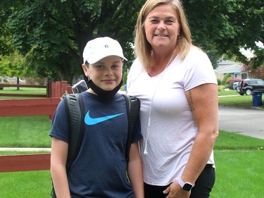 Nicole Boughner is excited about son Anderson, 11, starting classes at the new St. Angela Merici Catholic Elementary School in Chatham, Ont. on Thursday September 10, 2020, but also worried about him going to school during a pandemic. Ellwood Shreve/Chatham Daily News/Postmedia Network