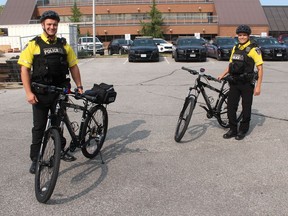 Chatham-Kent Police Service Constables Chris Reynolds, left, and Kim Pfaff, are among the local officers trained to serve on the new Bicycle Patrol Unit approved during Tuesday's police services board meeting. Ellwood Shreve/Chatham Daily News/Postmedia Network