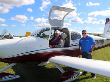 The Canadian Owners and Pilots Association - Chatham Chapter hosted a fly-in in for members of Trillium Aviators Ontario on Saturday at the Chatham-Kent Municipal Airport. Guelph resident Ivan Kristensen, in pilot's seat, a founder of the Trillium Aviators Ontario is seen here being welcomed by Aaron McPhail, vice-president of the local COPA chapter. Ellwood Shreve/Chatham Daily News/Postmedia Network