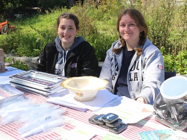 Volunteers Ashley MacCrimmon (left) and Lauren MacDonell at the welcome table at Springfield Farm on Saturday. Photo on Saturday, September 12, 2020, in Apple Hill, Ont. Todd Hambleton/Cornwall Standard-Freeholder/Postmedia Network