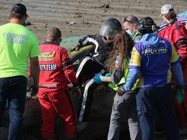 There's always a large safety team at the Fireball Enduro, to help out drivers such as this one, getting out of a car during a red flag stoppage in a men's four-cylinder heat. Photo on Saturday, September 12, 2020, in Cornwall, Ont. Todd Hambleton/Cornwall Standard-Freeholder/Postmedia Network