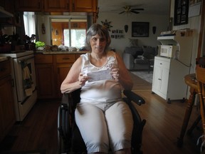 Lisa Richardson claims she gave Mike Auger of Hammer Away Construction $4,000 as a deposit on July 13, for some renovation work in her house, to make it more accessible given her disability in Cornwall, Ont. Joshua Santos/Cornwall Standard-Freeholder/Postmedia Network