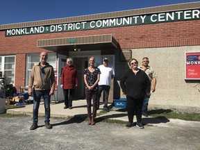 Township of North Stormont Coun. Steve Densham, left joined members of the Monkland and District Community Center committee, Sandra Bowness, secretary, Carol Shea, president, Matt Shea, Carol Travers and Pierre Thibault at the venue on Sunday. Sept. 20.
About $20,000 from the FCC AgriSpirit Fund will help the committee purchase a new windows, doors, and a furnace for the center. Joshua Santos/Cornwall Standard-Freeholder/Postmedia Network