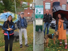 From left near the waterfront trail in Le Village are Pam and Ray Carson, Le Village vice-president Pierre Lefebvre, Lexa and dog owner Lydia Ksionda. Photo on Tuesday, September 29, 2020, in Cornwall, Ont. Todd Hambleton/Cornwall Standard-Freeholder/Postmedia Network