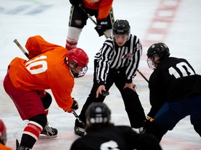 A linesman drops the puck during a scrimmage that was part of a Cornwall Colts camp held at the Benson Centre on Saturday August 29, 2020 in Cornwall, Ont. Robert Lefebvre/Special to the Cornwall Standard-Freeholder/Postmedia Network