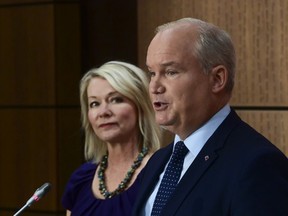 Conservative Leader Erin O'Toole introduces Deputy Leader Candice Bergen on Parliament Hill Sept. 2. He has tried to telegraph several priorities in the past few weeks.