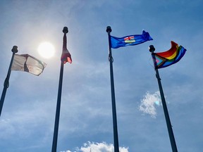 The Progress Pride flag joins the town, provincial and national flags up in the sunshine above the RancheHouse August 19. The flag was risen for the first time in an August 17 ceremony marking Cochrane’s first ever official Pride Week.