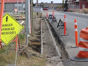 Some of the Railway Street utility work as seen September 20. Drivers should be able to move through the whole length of the street sometime next month. Patrick Gibson/Cochrane Times