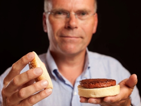 Dr Mark Post demonstrates the world’s first cultured hamburger in 2013