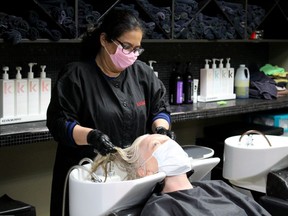 Gail Garber gets her hair washed at Hair Affair Salon and Body Studio in Fort McMurray on Thursday, May 14, 2020. Laura Beamish/Fort McMurray Today/Postmedia Network