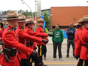 Members of the Wood Buffalo RCMP march during the Canada Day Parade in downtown Fort McMurray on Monday,, July 1, 2019. Vincent McDermott/Fort McMurray Today/Postmedia Network ORG XMIT: POS1907061609412711