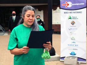 Anne Brule reads a proclamation from the City of North Bay designating Sept. 25 Franco-Ontarian Day, Friday. PJ Wilson/The Nugget