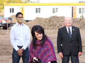 Delia, Alta. was a busy place as representatives from Prairie Land, including Shandele Battle, center, and the Town of Delia, represented by Mayor David Sisley, as well as MLA Nate Horner and representatives from Starland and Alberta Infrastructure gathered to break ground at the new Delia school site, which is located on the same property as the current school on Sept. 21. Jackie Irwin/Postmedia