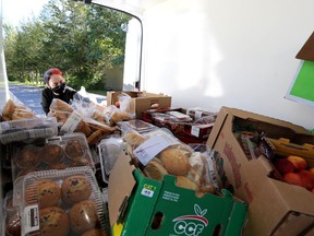 Morningstar Mission volunteer Hope Rose unloads a shipment of donated food from Lionhearts Inc. on Sept. 19, 2020, at the Napanee Lions Hall.