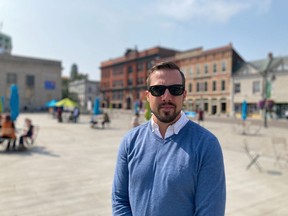 Kingston and the Islands MPP Ian Arthur outlined the Ontario NDP's new plan for businesses at Market Square in Kingston on Friday. (Peter Hendra/The Whig-Standard)