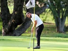 Jamaal Moussaoui drops a par putt to win the seventh hole during the final of the Kingston City Golf Championship against Ashton McCulloch at the Cataraqui Golf and Country Club on Monday. Moussaoui won the match, 4 and 2, for his third city match-play championship in the past six years. (Ian MacAlpine/The Whig-Standard)