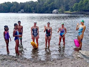 Ernestown Barracudas swimmers gather at Sydenham Lake during the summer of 2020. The Barracudas were not able to use their club pool at the W.J. Henderson Recreation Centre due to a leak in the pool. (Supplied Photo)