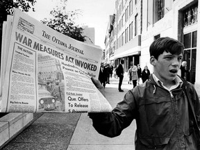 CP-Web.  A newsboy holds up a newspaper with a banner headline reporting the invoking of the War Measures Act, in Ottawa,  Oct. 16, 1970 the first time Canada had invoked the act in peacetime.  The act was put into effect following the kidnapping of British diplomat James Cross and Quebec Labour Minister Pierre Laporte by the terrorist FLQ. An author of Quebec's high-school history textbooks casts the federal government as the main villain of the October Crisis 40 years ago, disputes that Pierre Laporte was murdered, and defends the terrorist FLQ whose victims were, he says, mere "collateral damage" in the greater cause of independence.