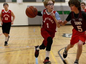 Players take part in the Pete Petersen Basketball League at St. Francis of Assisi Catholic School during the 2019-20 season. (Ian MacAlpine/The Whig-Standard)