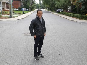 Queen's University associate professor Jeff Masuda outside his house in Kingston's University District on Wednesday. (Ian MacAlpine/The Whig-Standard)