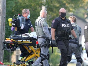 One of the three men who were stabbed in a home on Ford Street on Wednesday. Kingston Police responded to the scene in Kingston's north end after a man allegedly stabbed three people and then barricaded himself in the home. (Ian MacAlpine/The Whig-Standard)