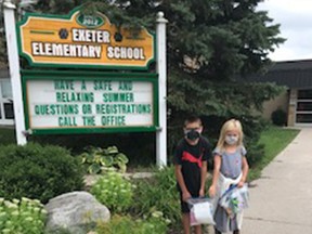 Thanks to a grant from the Grand Bend Community Foundation and the work of many volunteers, Noah's Ark recently distributed more than 600 back to school kits to area children. Pictured are Wayne and Izzy Loohuizen. Handout