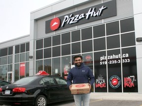 Exeter Pizza Hut opened Aug. 3 at Exeter's north end. Above is manager Krunal Patel who said the business is off to a good start. Scott Nixon