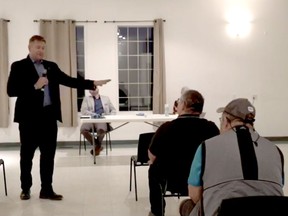 This is a screenshot from the live video MLA Shane Getson has posted on his Facebook page from a town hall meeting in Parkland village.