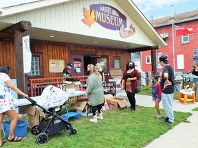 Photo by LESLIE KNIBBS/FOR THE STANDARDThe Massey Area Museum attracted many families to its large garage sale on Saturday. Many people also visited the historic displays in the museum. The people maintained social distance rule and wore masks. The Massey Area Museum event coincided with the Massey Agricultural Society Flea Market, held at the Massey Fairgrounds.
