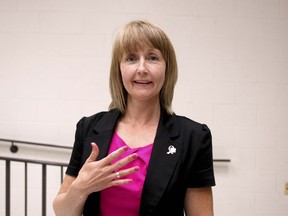 Canadian Cancer Society Run for the Cure volunteer director of logistics Melanie Gainforth shows her pink fingernails, Friday, at the North Bay Police Service headquarters. Michael Lee/The Nugget