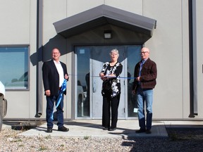 It's official. The ribbonwhas been cut on Nipawin's $21.9 million water treatment plant on Wednesday, Sept. 23. Left to right are: Fred Bradshaw, MLA Carrot River Valley, current Mayor Rennie Harper and former Mayor Dave Trann. Photo Susan McNeil.