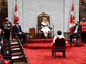 Chief of Defence Staff Jonathan Vance, Prime Minister Justin Trudeau, Senator Marc Gold, and RCMP Commissioner Brenda Lucki listen as Canada's Governor General Julie Payette delivers the throne speech in the Senate chamber in Ottawa, Ontario, Canada September 23.