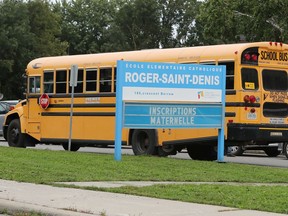 A school bus is parked near Roger-Saint Denis School earlier this week.