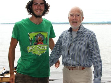 Georges Kirijian (left) and his grandpa Les Dominy of Renfrew were all smiles after reuniting on the shore of the Ottawa River in Pembroke Aug. 21 after Georges and the Canoe4COVID crew made a pit stop on the way to the final destination of Ottawa.