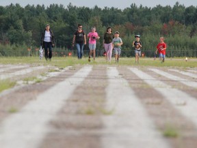 The first Walk the Runway event held at the Pembroke and Area Airport on Sept. 2 brought in just over $4,300 for Project Runway, the fundraiser to raise the $1.25 million needed to repace the runway. In the photo are a group of participants, from left, Lianne Hamilton, Lauren Trute, Andrew (last name not provided), Katherine Hill, Tristan Hill, Alex Hill and Alex (last name not provided). Anthony Dixon