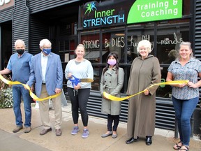 Inner Strength Training and Coaching held its official ribbon cutting ceremony at its expanded location in Downtown Pembroke. Taking part in the ceremony were (from left) PBIA board member Mike Powell, Pembroke Mayor Mike LeMay, owner Jodi Sauve, Karishma Daya-Taylor representing MPP John Yakabuski, MP Cheryl Gallant and Janna Fortin, chairwoman of the Pembroke Business Improvement Area board. Tina Peplinskie