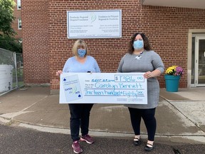 Carolyn Bennett, left, was the lucky winner of the Pembroke Regional Hospital Foundation's Catch the Ace Online progressive jackpot raffle for week number 11. Making the presentation for the week 11 pot amount of $1,386 is Leigh Costello, the Foundation's community fundraising specialist. Submitted photo