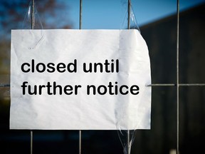 Sign on a fence with the inscription closed until further notice

Not Released (NR)
