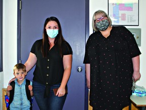 Pictured above from (l. to r.) are Nash and Peggy Klassen and Drayton Christian School Principal Terri-Lynn Emms. Nash is starting in Pre-Kindergarten this fall and paid a visit to the school before it officially opened on September 8.  Cathy Weetman